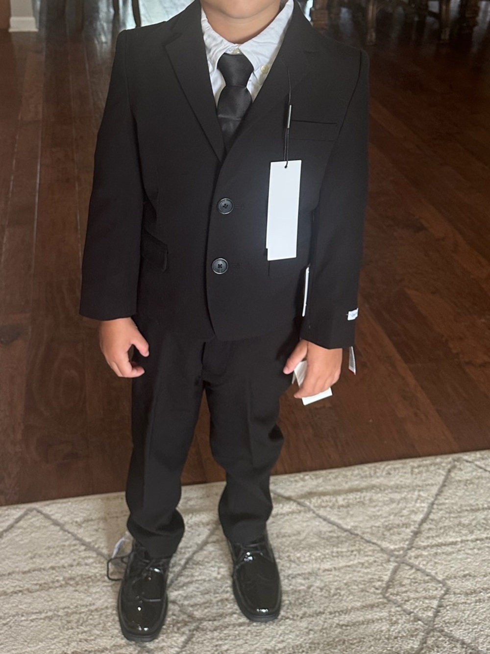 Calvin Klein “Infinite Stretch” Boys Black Suit Set with Tie